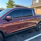 Maroon SUV parked outdoors