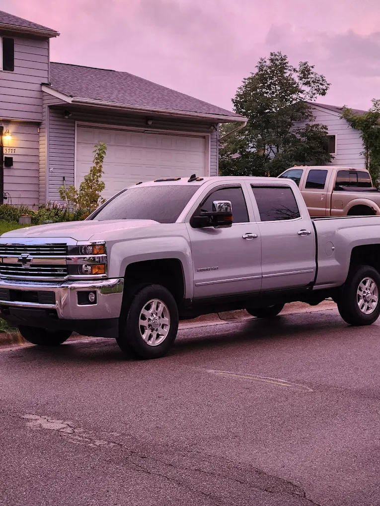 Silver pickup trucks parked outside
