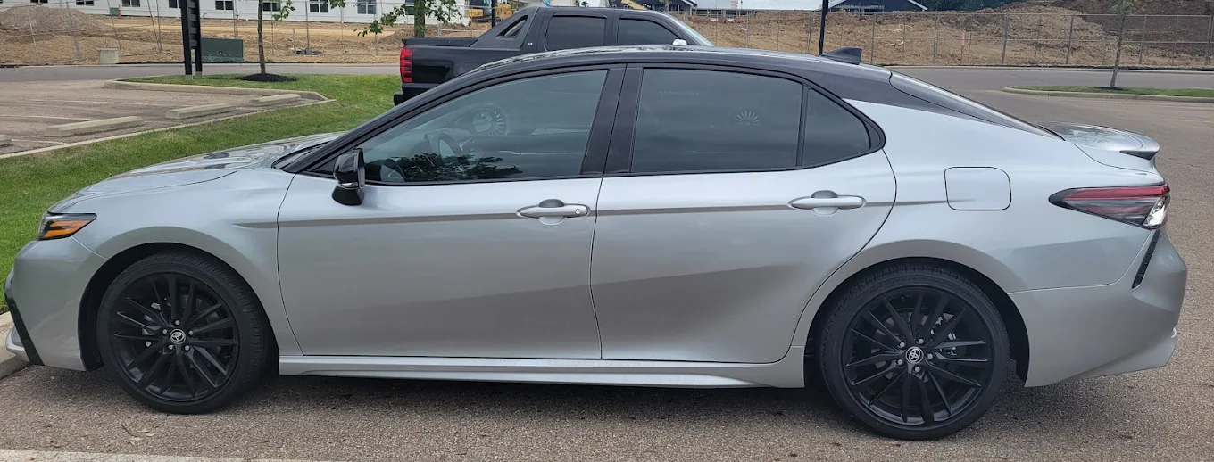 Silver sedan parked outdoors