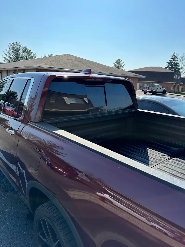 Maroon pickup truck bed